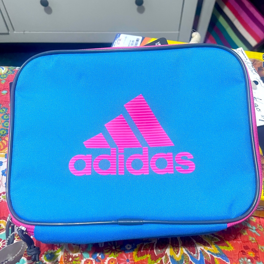 BNWT Adidas insulated lunch bag with zipper closure.